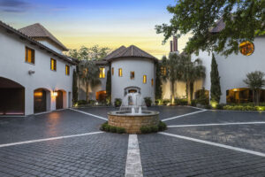 Courtyard with a fountain to a lovely home